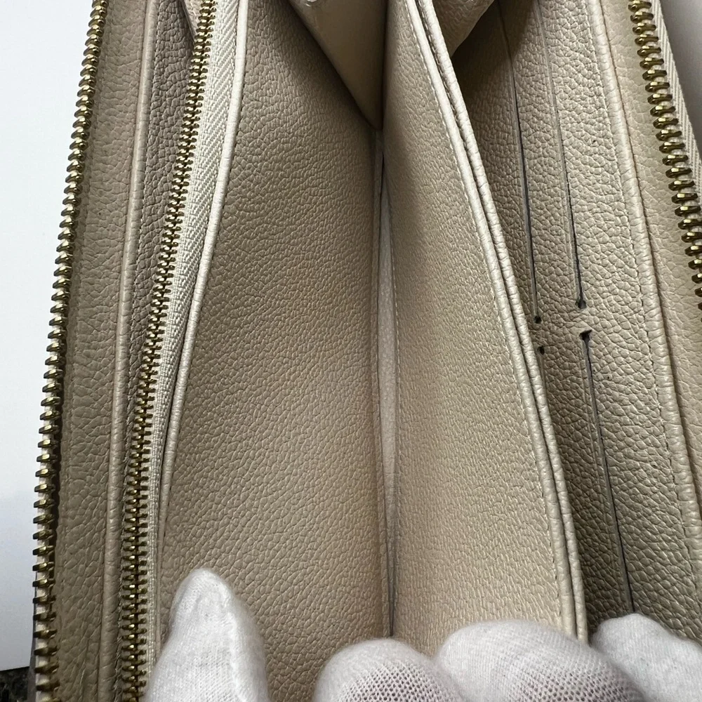 GUC Louis Vuitton Monogram Cream Empreinte Zippy Wallet - Picture 6 of 11